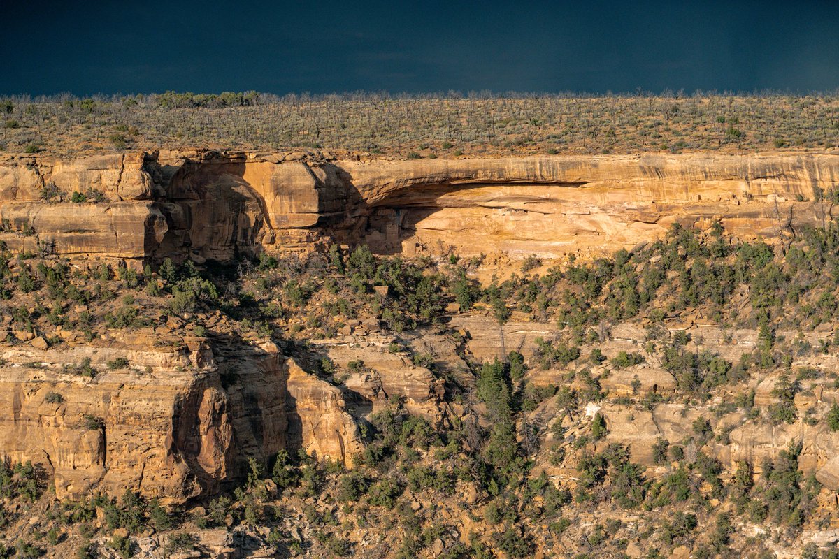 north0fnorth's tweet photo. when we went to mesa verde national park on july 19 there was this giant storm that barely missed us and gave all my photos this almost apocalyptic-looking lighting https://t.co/nlYGY6AkOl
