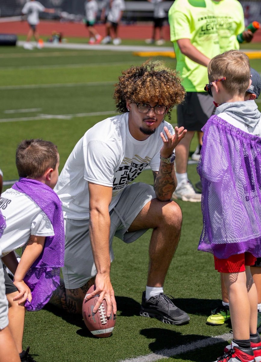 TCarltonLewis's tweet photo. On his last free day before the start of fall camp, Ju hosted his first Youth football camp. 200 kids came and spent an afternoon training and competing. As a father it was a full circle moment. Truly thankful for where God has brought him from.
#AlmostTime https://t.co/Py94F0aCg1