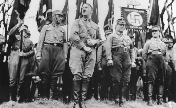MADDMaxxXIV's tweet photo. Everything your history teacher told you about this man was a lie.  
He warned us:
🔺 The natural conclusion of liberal democracy would be a corrupt and immoral society.
🔺 Liberal democracy would ultimately lead to a tyrannical surveillance state.
🔺 Liberal democracy would plague Europe with a mongrel race.
🔺Race mixing would result in reversing the ascent of our genetics. We now live in an absolute Idiocracy.
🔺 Democracy would lead to a paralyzed state too weak to defend itself against Zionism and Communism. 
🔺Jewish bankers would enslave White Nations with debt.
🔺 Communism would creep in through unwise voting.
🔺 Capitalism is globalism. 
🔺 Communism is globalism.
🔺 Nationalism is the only antidote.

Taking your own side is the most rational and moral position a man can take. It signifies he is in harmony with Nature and her Sovereign Laws.

Democracy is the absence of leadership, by definition. 

Communism is the eradication of the best among us in order to find equality at the lowest common denominator. 

Fascism is leadership by the best man amongst us; who cares for his people like a father cares for his children.