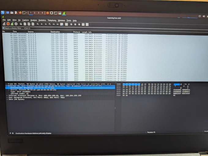 A photo of Wireshark, showing a packet capture of the module broadcasting DHCP discover messages on 255.255.255.255