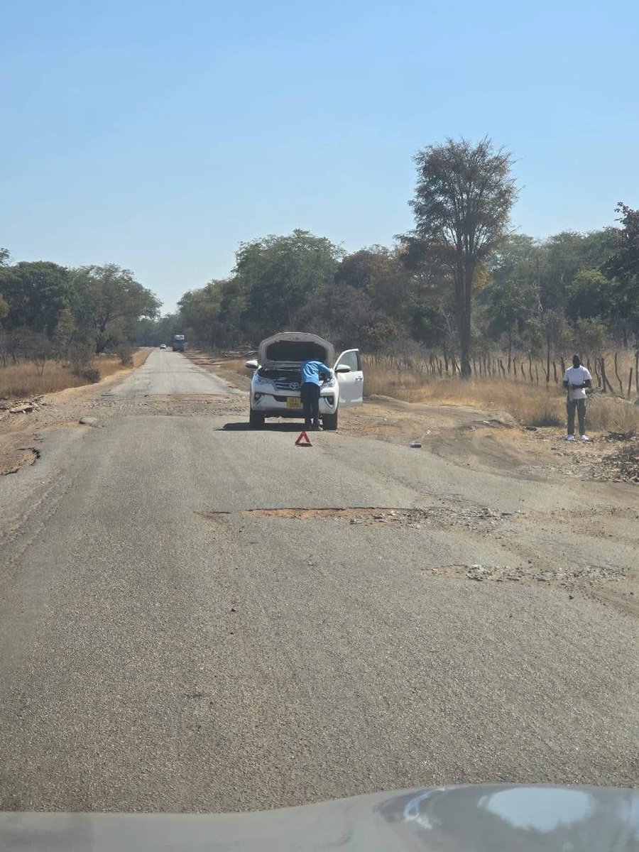 CrimeWatchZW's tweet photo. Here's my personal account of driving on the Bulawayo to Victoria Falls.

Let me say that upon arrival back in Bulawayo I will need a Physiotherapist, a Chiropractor & a deep tissue massage. The road is that bad. It is horrendous! Awful! Disgusting! It's shameful that Zimbabwe would call this a National highway. 

This is Non- road. Sometimes we came to a complete stop because there was a lorry coming towards us. The drop offs onto the gravel are quite sharp & deep. We did drive on the sides often but the holes on the sides are huge. So, my report is "Be prepared mentally for a 5 hour journey from Bulawayo to Hwange main camp. 

Take food & drinks, have a good music selection & just drive.

📸Shereen Thompson, Facebook