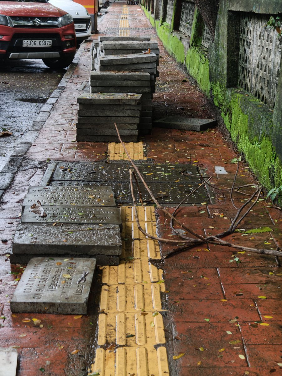 mashrujeet's tweet photo. As per BMC commissioner's recent directions under the 'Pedestrian First' campaign, all obstructions, including construction material and other objects, must be removed from footpaths to keep them safe and accessible for pedestrians.

The direction also states that paver blocks should not be used for new footpaths.

This is at Mahavir Nagar, near Kandivali West Metro Station, Kandivali West.

@mybmc