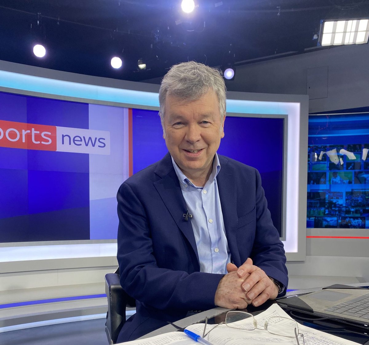 Nick Powell wearing a blue jacket and shirt on the Sky Sports News set