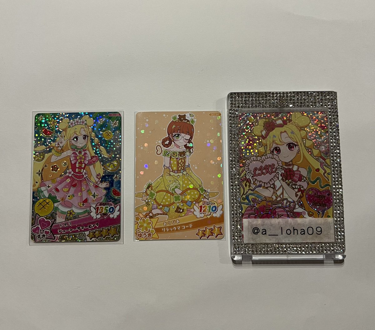 a_loha09's tweet photo. @Py5ISIi8IDF0H0M はじめまして、検索より失礼いたします。
当方、画像1枚目所持しております。
画像お借りして赤枠との交換は可能でしょうか？
ご検討よろしくお願いいたします。 https://t.co/ah1Z7V3ERU