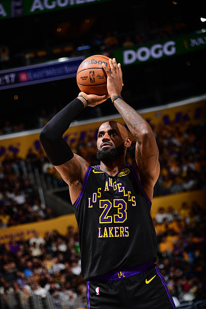 ClutchNumbers's tweet photo. Best Mid-Range FG% In The 2025-26 NBA Playoffs (Min. 20 Mid-Range FGA):

1. LeBron James — 57.1%
2. Jaden McDaniels — 56.7%
3. Mikal Bridges — 53.1%
4. CJ McCollum — 52.2%
5. Devin Vassell — 50.0%
5. Joel Embiid — 50.0%
7. Jaylen Brown — 48.6%
8. Donovan Mitchell — 47.7%
9. De'Aaron Fox — 47.1%
10. Paolo Banchero — 46.7%