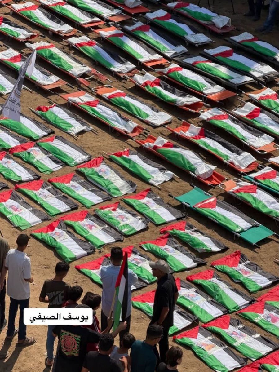 dn_osama_rabee's tweet photo. A solemn funeral procession bids farewell to 112 martyrs from a single Palestinian family who were killed during the genocide. https://t.co/6Ev0KVdNoy