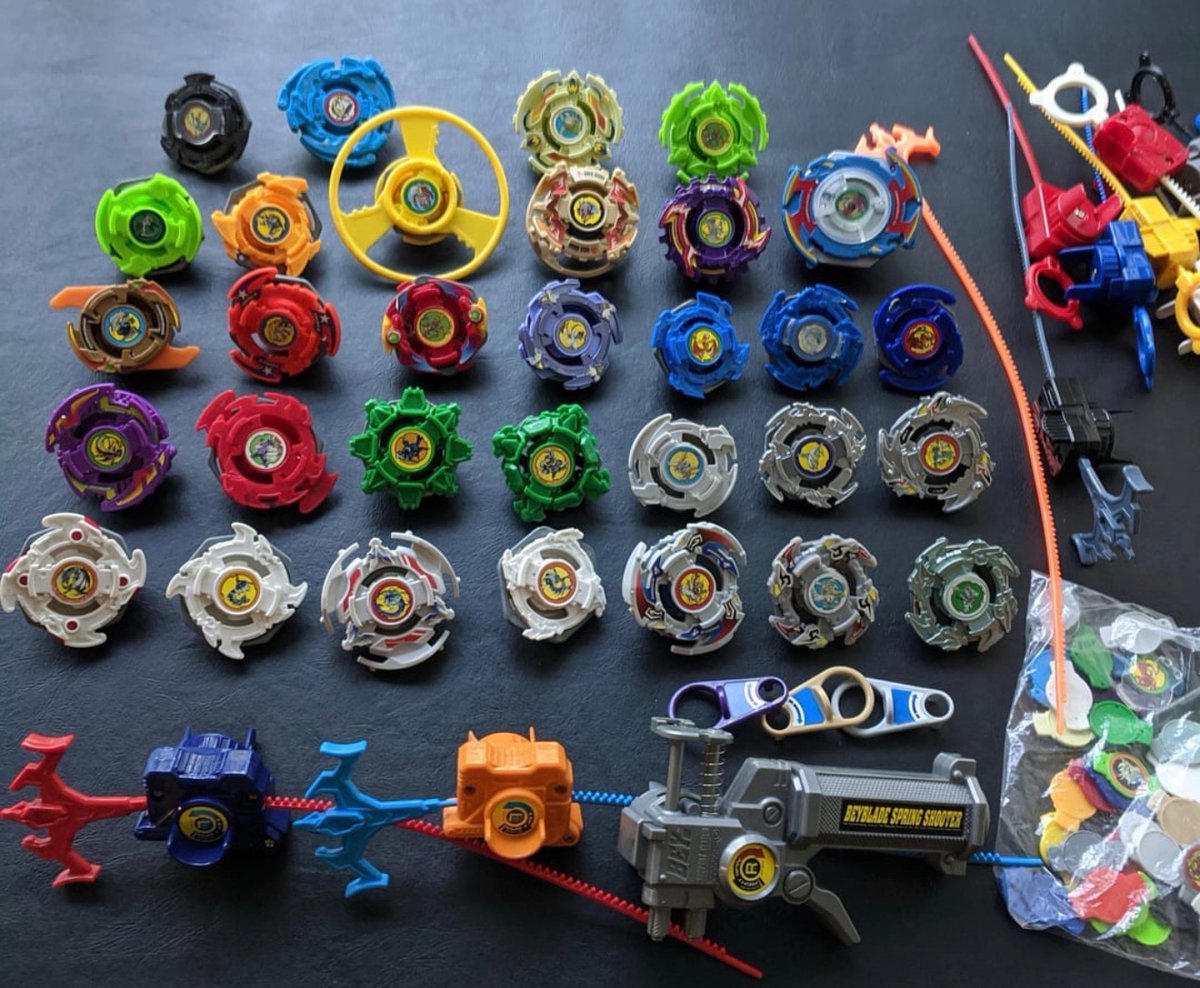 NostalgiaYZ's tweet photo. The Beyblade era was peak living as a kid. https://t.co/4xMweG5fum