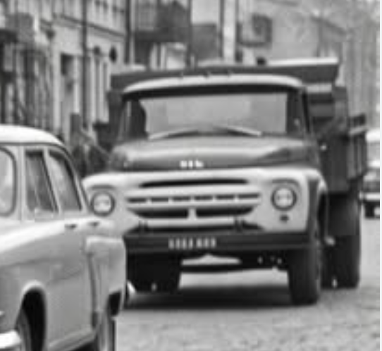 upside_zebra's tweet photo. @AnyameRev @crobe2222 @sovietvisuals You see, ZIL 130 didn't exist in 1960 yet. 

And even if we suppose the shot was made later, the grill on this "photo" is incorrect — the actual grill has 5 horizontal pillow-shaped holes, while this phantom has 6. It's like the wrong number of fingers 😂 https://t.co/tc945pGl5h