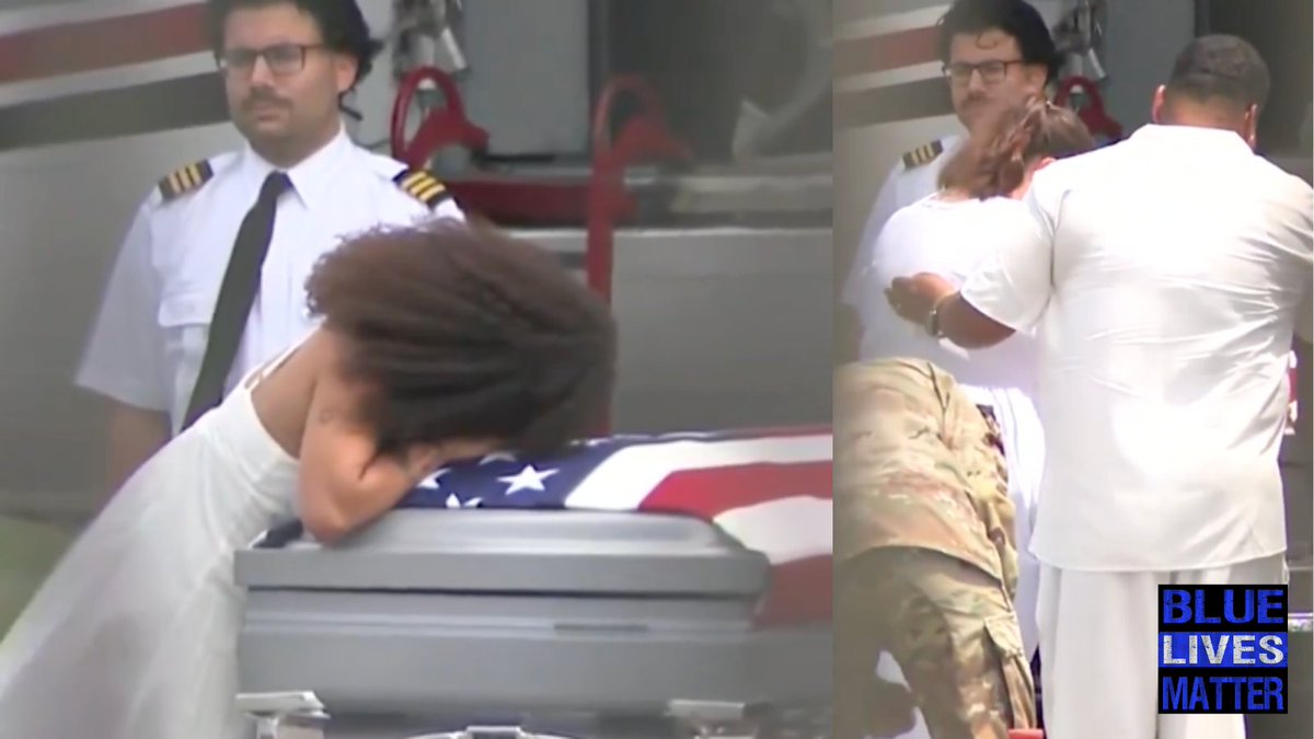 bluelivesmtr's tweet photo. THIS hurts: A wife collapses over her husband’s flag-draped casket as a Fort Bragg soldier comes home.

Staff Sgt. Michael Emmanuel Swinton, 30, was k*lled on July 19, 2026 at Erbil Air Base in Iraq while disposing of a downed Iranian drone.

Flying debris from the controlled detonation took his life. He leaves behind his wife Jamiah and two young children.

On Monday the family gathered at Fayetteville Regional Airport.

Video shows Jamiah in a white dress leaning her full body across the silver casket, her face buried against the American flag as relatives and service members stand close.

A water cannon salute marked the plane’s arrival before the procession to Hope Mills.
He will be laid to rest Saturday at Southview Baptist Church.

A husband and father is gone. The pain on that tarmac is what service to this country can cost a family.  And in the meantime... the left continues to demonize those who serve.

#FallenHero #FortBragg