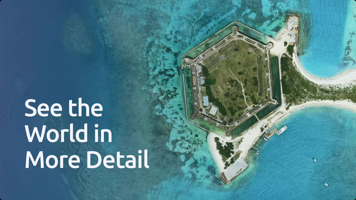High-resolution aerial satellite view of Fort Jefferson in Florida surrounded by clear turquoise ocean water.