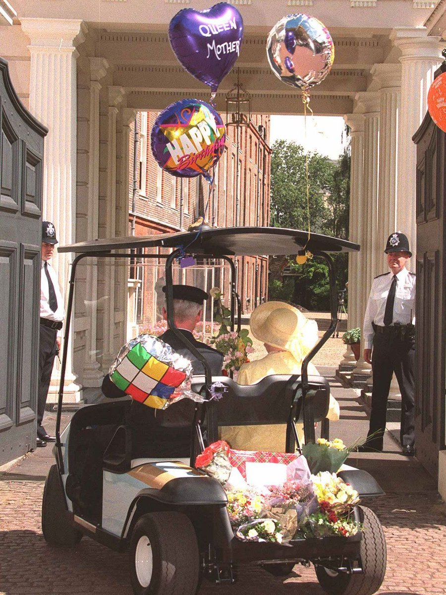 Tatlermagazine's tweet photo. On this day in 1999, the Queen Mother emerged from Clarence House in a lemon-yellow ensemble to greet the 5,000 well-wishers who had gathered for a glimpse of the nation’s oldest and perhaps most beloved royal.

She strolled through the crowds accepting bouquets, warm wishes and even a ‘99’ ice cream, before boarding her infamous ‘Queen Mum Mobile’: a golf buggy painted in the blue-and-gold colours of her racing silks and festooned with balloons for the occasion.

Later, she was joined by members of the Royal Family, including Prince Charles and her great-grandsons, Princes William and Harry, before retreating for her annual Garden Luncheon.

More of the Queen Mother’s most memorable photographs:https://t.co/vOixo6hk9N