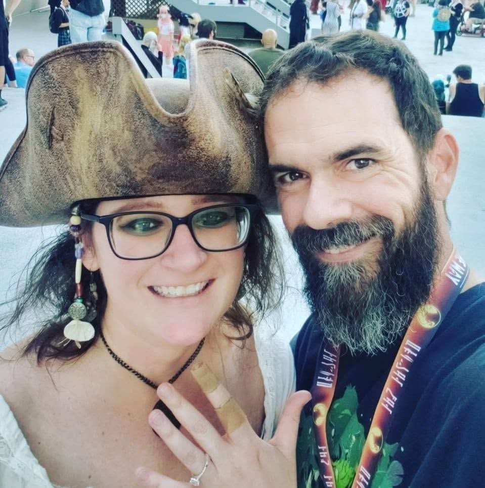 Darth_Jader_'s tweet photo. Josh T. &amp; have shared many an adventure over the years—from #DragonCon side quests to honeymoon horseback riding. We entered America's Favorite Couple  for fun, &amp; we're touched that friends have been cheering us on. If you'd like to support us, see the code in the comments! https://t.co/G1xksApfCw