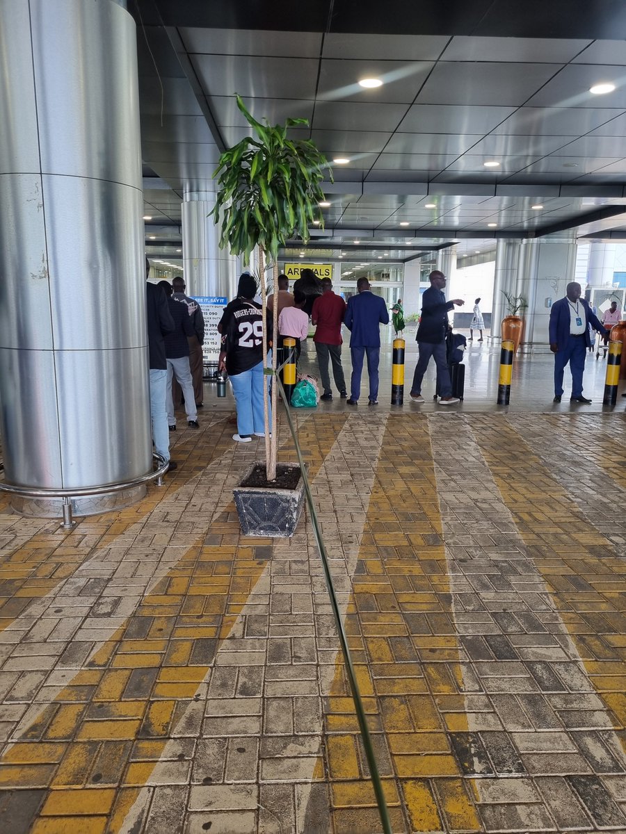 tonvionny's tweet photo. Dear @UgandaCAA, how about some display screens at the Arrivals section Showing people coming out. We can't be standing and peeping all the time https://t.co/9lz6mlJnSO