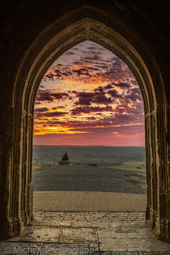 Glastomichelle's tweet photo. The two archways at Dawn. Both images taken this morning in St Michael's tower on Glastonbury Tor. Taken just a few moments apart. Which is your favourite? https://t.co/sYpw52ph5o