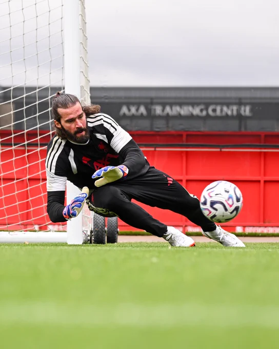 Alisson Becker in action at the AXA Training Centre