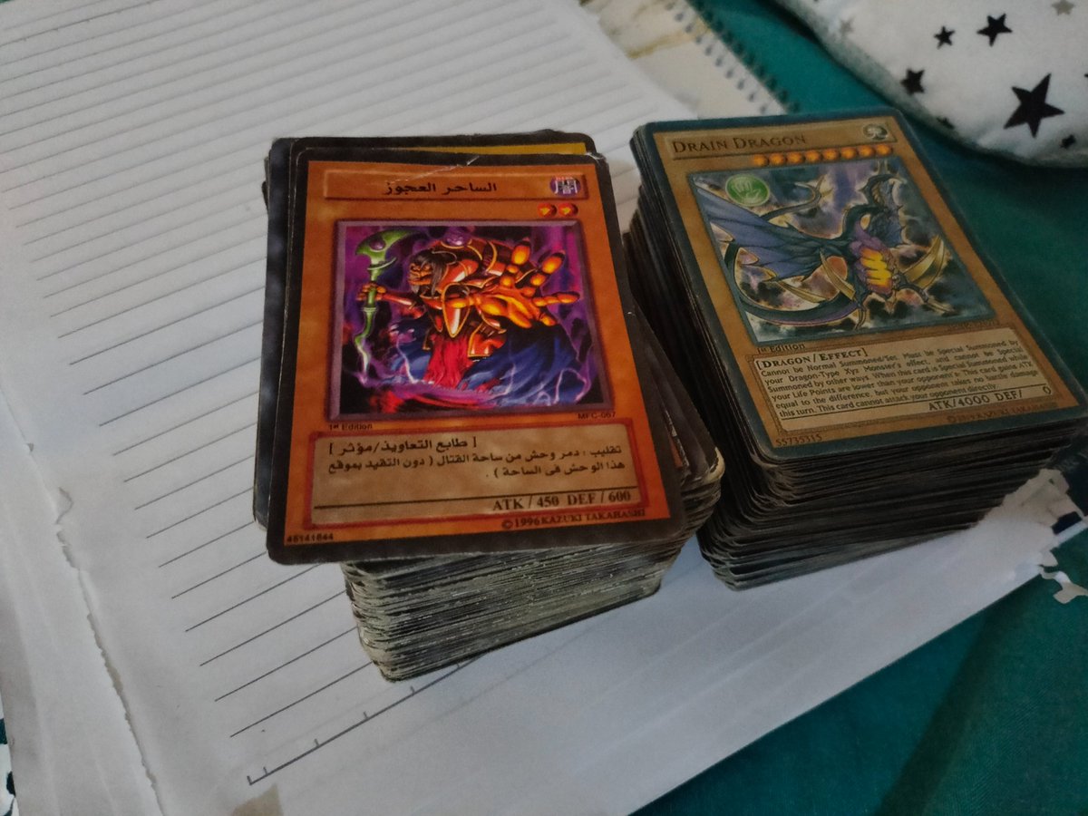 Haruthmr's tweet photo. 9 years old me with a yu-gi-oh larper that just bought those card for fun now idek what to do with approx 200+ cards in both arabic and English. https://t.co/gZHCeuyFX3
