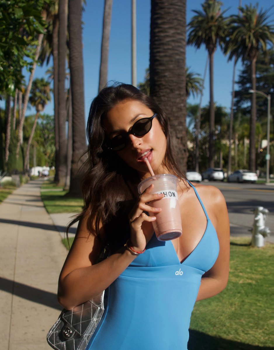 saintedbloom's tweet photo. pretending that everything is going to be okay, as long as i have my favorite smoothie on hand, bathed under the summer’s sun, wearing my favorite summer’s set from alo. suddenly, life is worth living again. i am very much in love. smooches. ♥︎ https://t.co/tp1WHVOer5