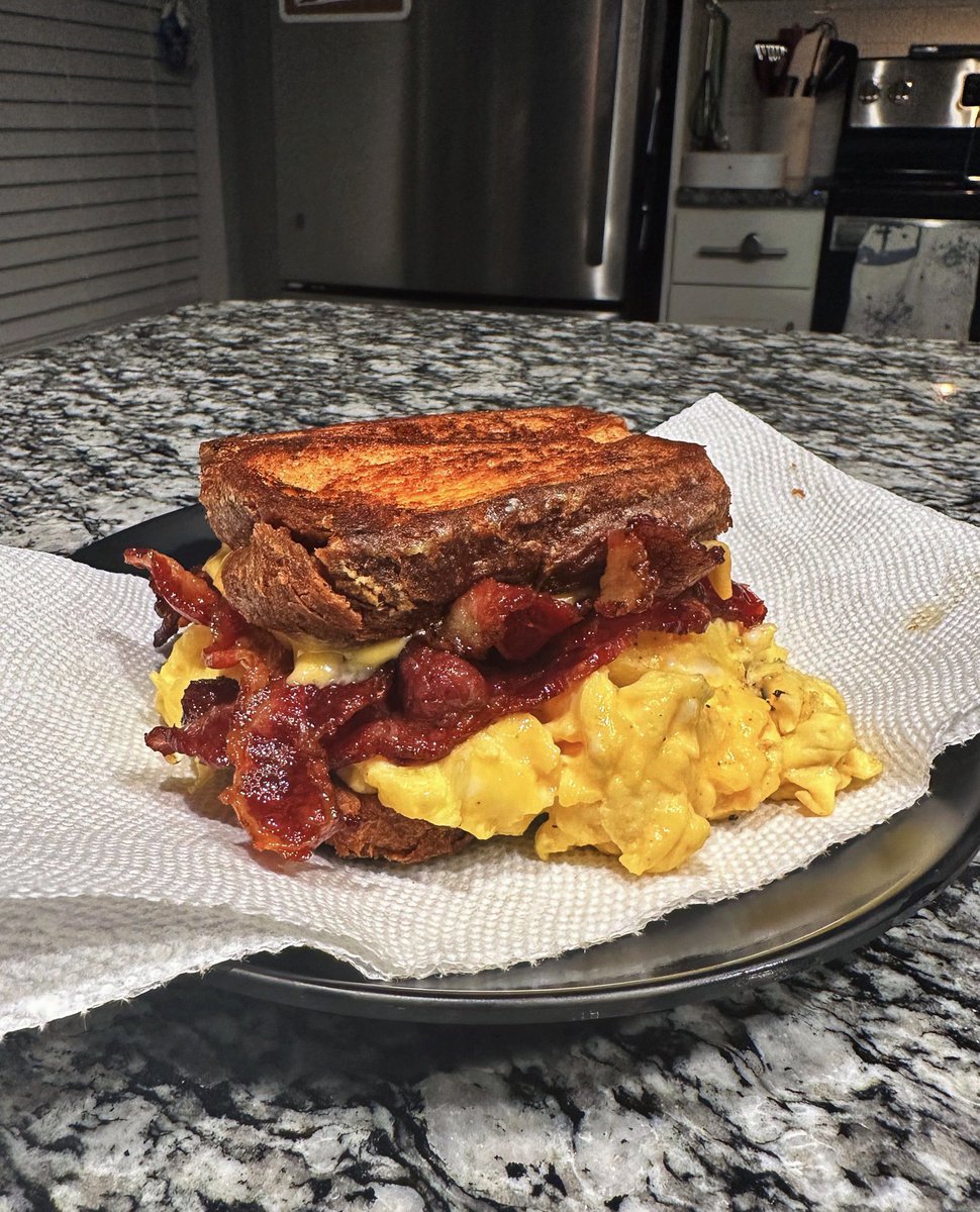 ReddCinema's tweet photo. She sent me off to work with a french toast bacon egg and cheese 😋 https://t.co/FPS6gcm9yF