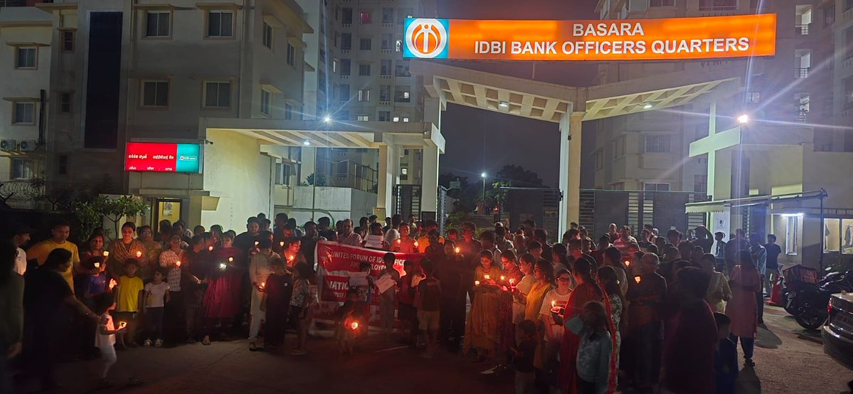 bankaffairs's tweet photo. **A Nation’s Trust, a Workforce’s Dignity**

Under the quiet night sky at Basara IDBI Officers Quarters, candles flickered not in mourning, but in resolve.

@UFBUIndia are you there ?🤔

Families stood together. Children held handwritten signs. Officers and employees of IDBI Bank raised a single, clear voice:

**We oppose the privatisation and sale of IDBI Bank.**

This is not merely a fight for jobs.  
It is a fight for the dignity of public sector banking.  
For the safety of thousands of families who built their lives around an institution meant to serve the nation, not private balance sheets.  
For the trust of ordinary citizens who deposit their hard-earned savings in a bank they believe belongs to the people.

When a public sector bank is put on the auction block, more than ownership changes.  
Security becomes uncertainty.  
Service becomes profit-first.  
The human face of banking risks being erased.

The United Forum of IDBI Officers and Employees has called a nationwide protest. From quarters to streets, from silent candle vigils to raised banners, the message is the same:

**Privatisation is not reform when it comes at the cost of dignity, livelihood, and public trust.**

We stand with every officer, every employee, every family holding a candle tonight.  
Because some institutions are not commodities.  
They are the backbone of a nation’s economic conscience.

**Save IDBI. Protect public banking. Honour the people who built it.**

@IdbiFor
@nsitharaman
@DFS_India