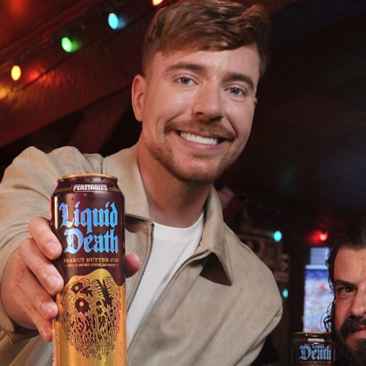 Dexerto's tweet photo. MrBeast and Liquid Death turned Feastables peanut butter cups into a sparkling water flavor

The drink has just 10 calories, 3g of sugar and no actual peanuts https://t.co/V9psErCiA0