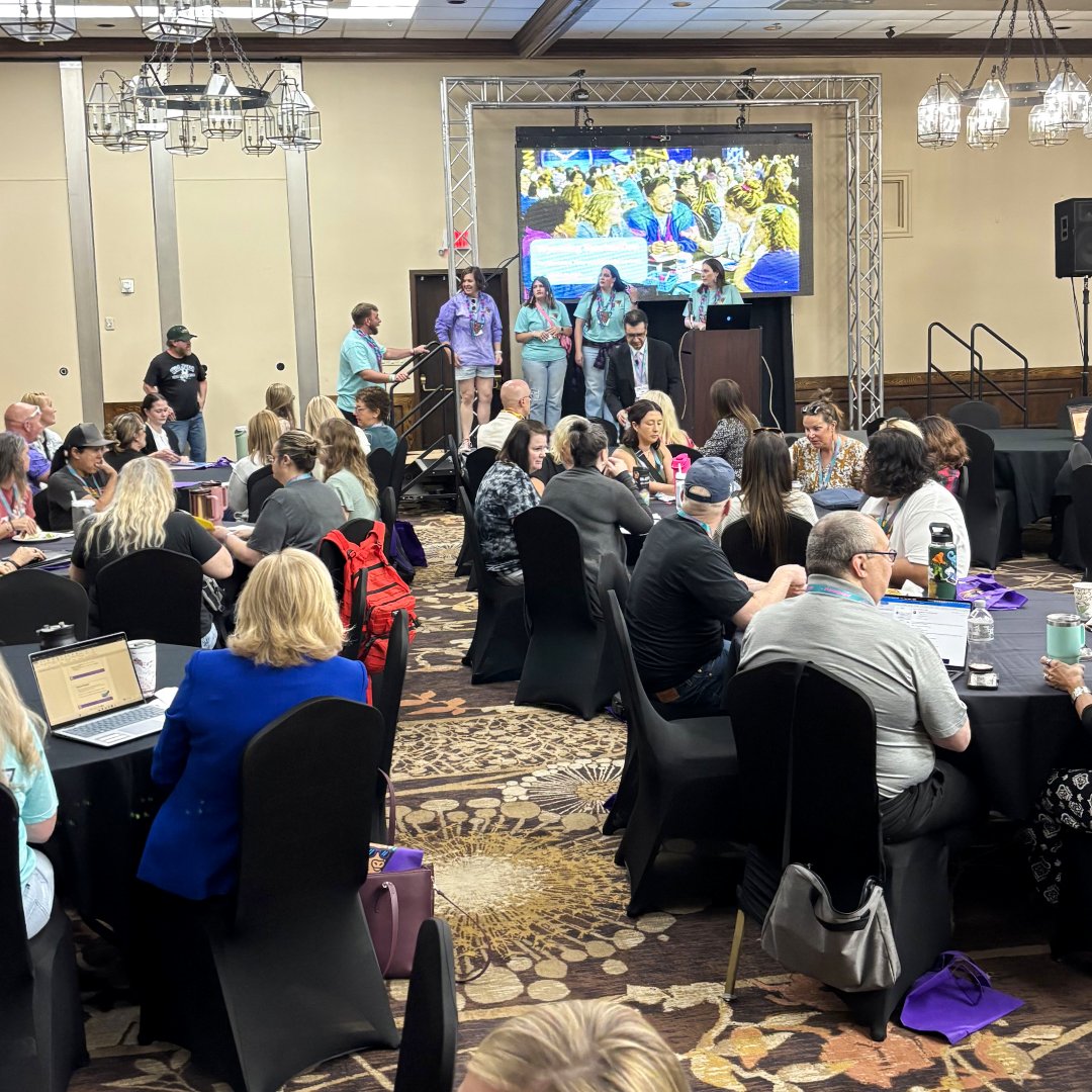 WYOEducation's tweet photo. TeacherCon26 is a FULL HOUSE! And we aren't just saying that because of the 90's theme. Educators from across #Wyoming are learning and sharing strategies to improve education statewide. Thanks to Superintendent Degenfelder and the #WyDeptEd team for this wonderful event! https://t.co/qg8ucR1XkV