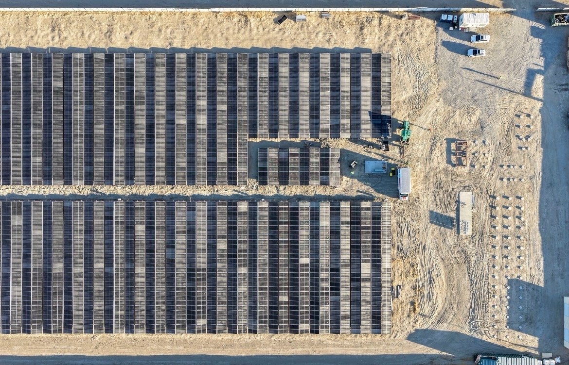 CJHandmer's tweet photo. Last week the hydrogen electrolyzer team @terraformindies pulled off yet another first, the sustained production of >99.9% pure H2 from our vertically integrated, California-manufactured electrolyzer stack while it was coupled directly to a solar array at our Muroc desert test site. 

WTAF?

Most commercial electrolyzers need carefully conditioned power from expensive battery-meditated backup systems. Ours runs directly off the sun. Clouds pass, the day turns to night, and we maintain purity from a stack whose Bill of Materials cost is well below $100/kW.

Terraform's single-minded focus on capex reduction has allowed us to convert sunlight to hydrogen in an unprecedented demo at a cost below $2/kg. If that wasn't enough, we have a crystal clear plan of steady execution to push that cost below $1/kg in the coming years. 

Rather than linger on this point in response to experts-with-spreadsheets who said this was not only beyond my team, it was forbidden by known laws of physics, let me tell you a bit about how we actually pulled this off.

We started building this test site in March. Once the panels and electrics were in place the CO2 team were the first to demonstrate production on site. Close behind them the electrolyzer team planned the logistics necessary to project substantial operational ability into a hostile test site in the middle of nowhere. It's no good to find you're missing a wrench half way through the day!

Much of the test prep was completed before dawn, when the panels go live. The sun came up and the stack immediately started splitting water into hydrogen and oxygen. The team carefully monitored purity and flammability as the sun climbed through the sky. As designed, the stack warmed up and conducted even more power, maintaining solid production until late afternoon when the setting sun shaded the panels. 

Terraform's synthetic fuel system is uniquely designed to follow the sun and extract the maximum possible value from cheap solar panels.

Hydrogen is a pernicious molecule. It leaks through and embrittles metals, burns almost invisibly at a wide range of mixtures in air, burns hot and fast and can easily undergo detonation transition, and has about half a dozen other spookily dangerous properties. My advice is to never work with it unless you absolutely have to. The Terraformer produces and consumes H2 in one compact discrete area with a minimum of complexity and fuss, and as expected this demo was completed in accordance with our rigorous safety standards and no unscheduled excitement!

This successful demonstration was also a profound milestone for the team after a testing anomaly last December compelled us to finally rip off the bandaid and move decisively towards the "future design" with half the parts but considerable complexity in assembly. No-one else makes electrolyzers this way and we, more than anyone, know exactly why. And also how to do it anyway, translating directly into a unique cost advantage.

A huge congratulation to Ken, Sherman, @ckalitin, Nikhil, Abdullah, and Aaron for their successful test campaign. 

Terraform's hydrogen and CO2 are the chemical precursors for synthetic methane and methanol, which we make in our own synthetic fuel reactor. 

Combined, we make oil and gas out of sunlight and air. We are breaking the geological and geographical monopolies on oil production.

In the limit, Terraform will deploy these electrolyzers by the millions and they will all be plug-and-play with solar PV arrays.

The Muroc smoke test campaign is far from over. 

We will win!