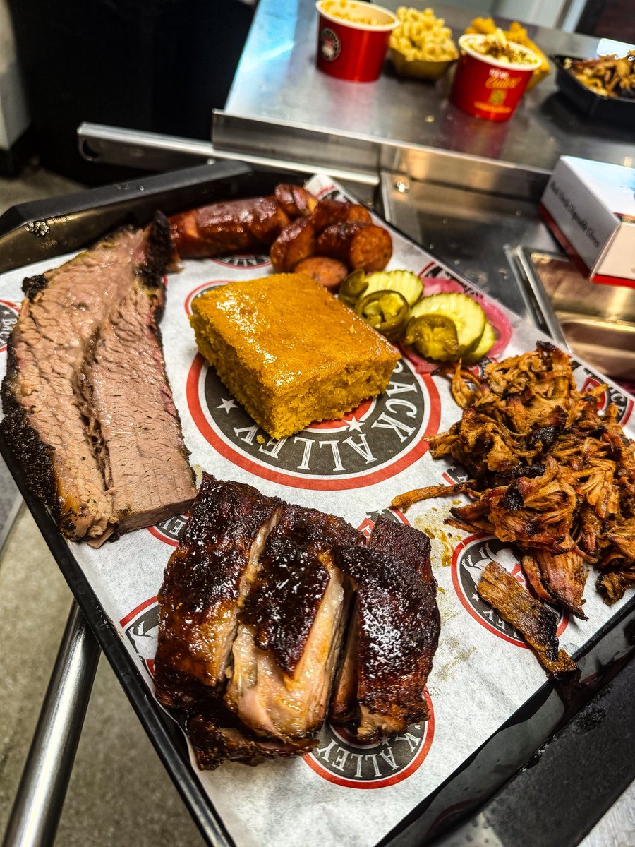 Chefmarkcoakley's tweet photo. Thick-cut brisket, sticky smoked ribs, tender pulled pork, jalapeño sausage, and a square of that rustic cornbread soaking up all the juice.
Straight heat. No filter needed.
#SmokedBrisket #RibGame #BBQLife #MeatPlate https://t.co/TSCdbcgDjc