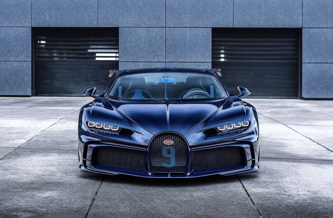 PoundedStance's tweet photo. Deep blue carbon armor and a glowing number nine, waiting to unleash a storm. 🖤🔥 https://t.co/TjZRASrxHX