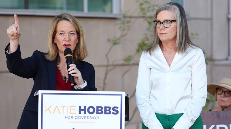 KTAR923's tweet photo. Arizona AG Kris Mayes says the criminal investigation into Gov. Katie Hobbs' ties to a donor contractor is "near the end" and expects results before the November election. 

The probe centers on allegations that a foster care provider received preferential treatment after donating $400K to benefit Hobbs and the Democratic Party.

STORY: https://t.co/mJ0iIB61Vl

Photo by Mario Tama/Getty Images)