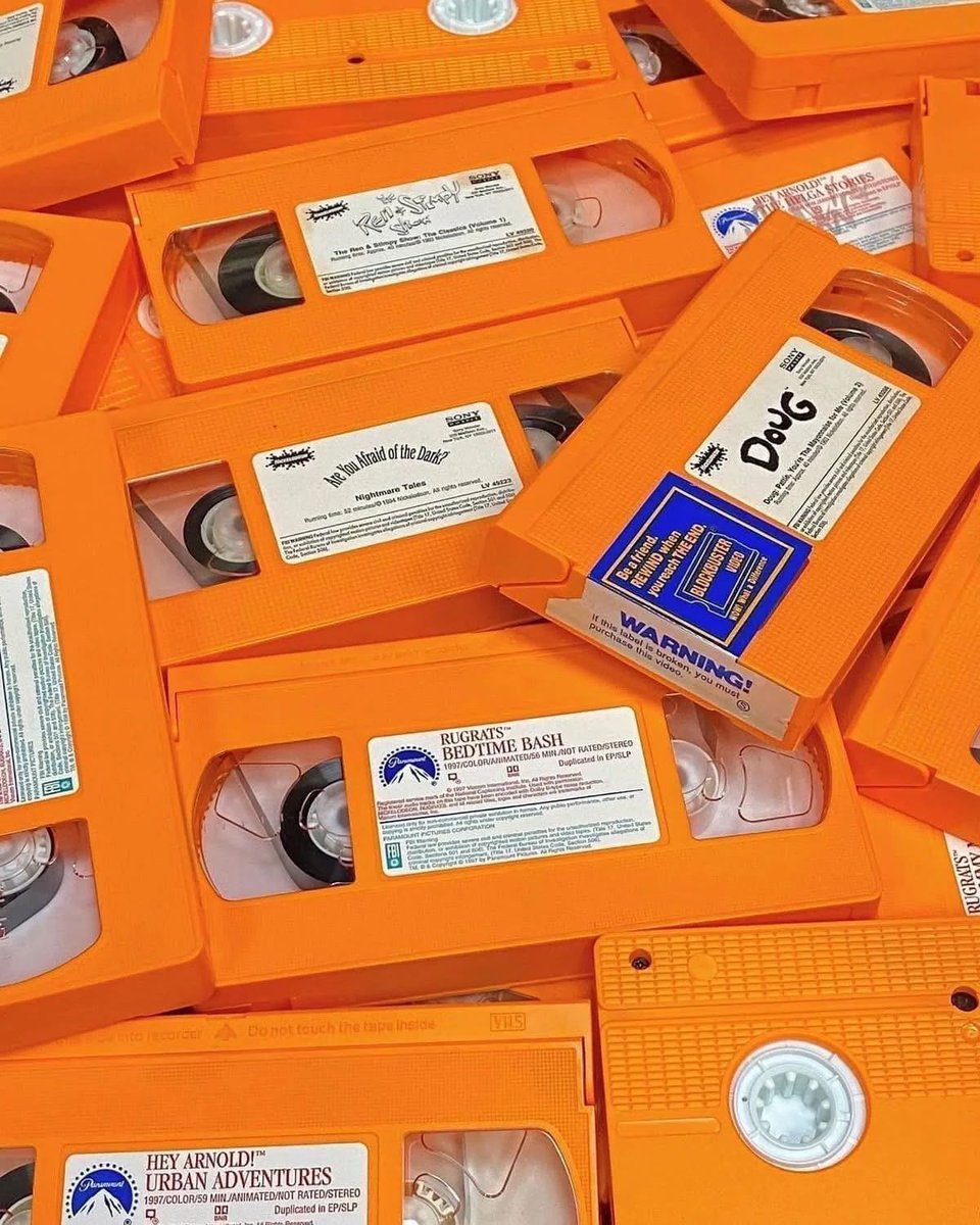 oldmedia's tweet photo. Orange Nickelodeon VHS tapes https://t.co/Us4wRixsyc
