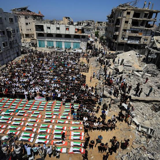 MahaGaza's tweet photo. Everyone watched the mass funeral of 112 Palestinians whose bodies were finally retrieved from under the rubble, nearly 3 years after an Israeli massacre in Gaza in November 2023.

What the world doesn’t know is that more than 150 people remain missing at the same site. Their bodies have likely decomposed or been torn apart, leaving their families without even the chance to bury them.