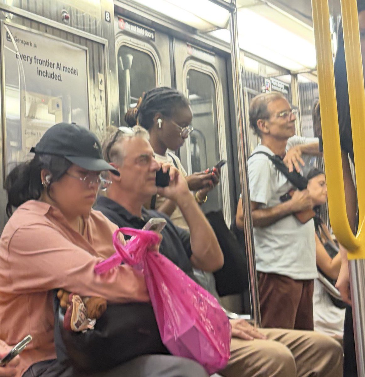 magdovitz's tweet photo. Only in New York could this be my commute🍎: Board 6 train: Dude openly smoking a crack pipe between subway cars. 

Two stops later: “Mr. Big” from Sex and the City steps on like it’s just another Tuesday.

The melting pot is truly undefeated. 
#longnyc ❤️ https://t.co/w2NYOGQps2