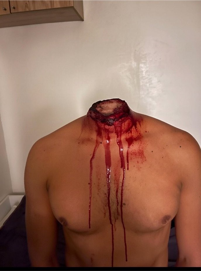 HeadlessBehead's tweet photo. beefy strong man beheaded with his hood #beheading #beheaded #AI #nbm #gayporn #fetish https://t.co/KJzoca0uqD