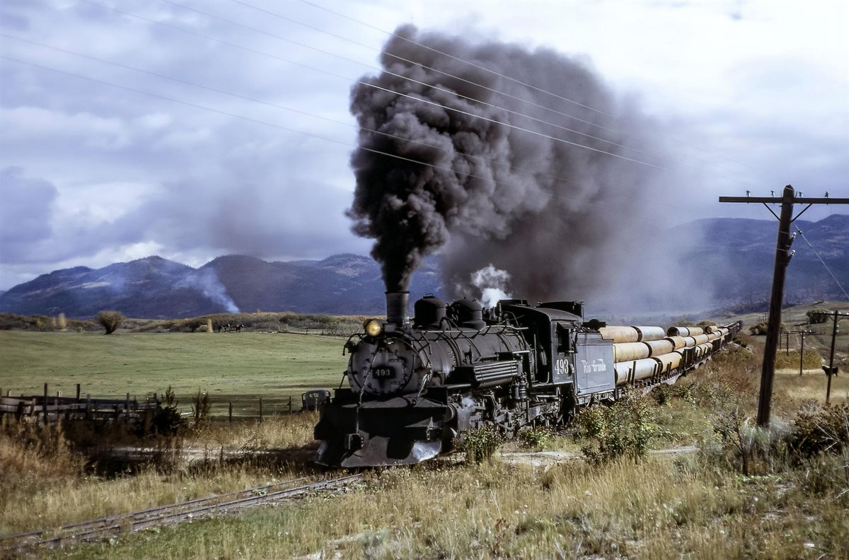 damotacamiwp's tweet photo. Denver &amp;amp; Rio Grande Western K-37 narrow gauge 2-8-2 #493 leads a trainload of pipes just two miles west of Chama, New Mexico and headed for the oil fields at Farmington, NM on October 3rd, 1967. The discovery of oil in '51 made the low-revenue Farmin...

#TrainSpotting #$VIC https://t.co/3yNtIF4CGd
