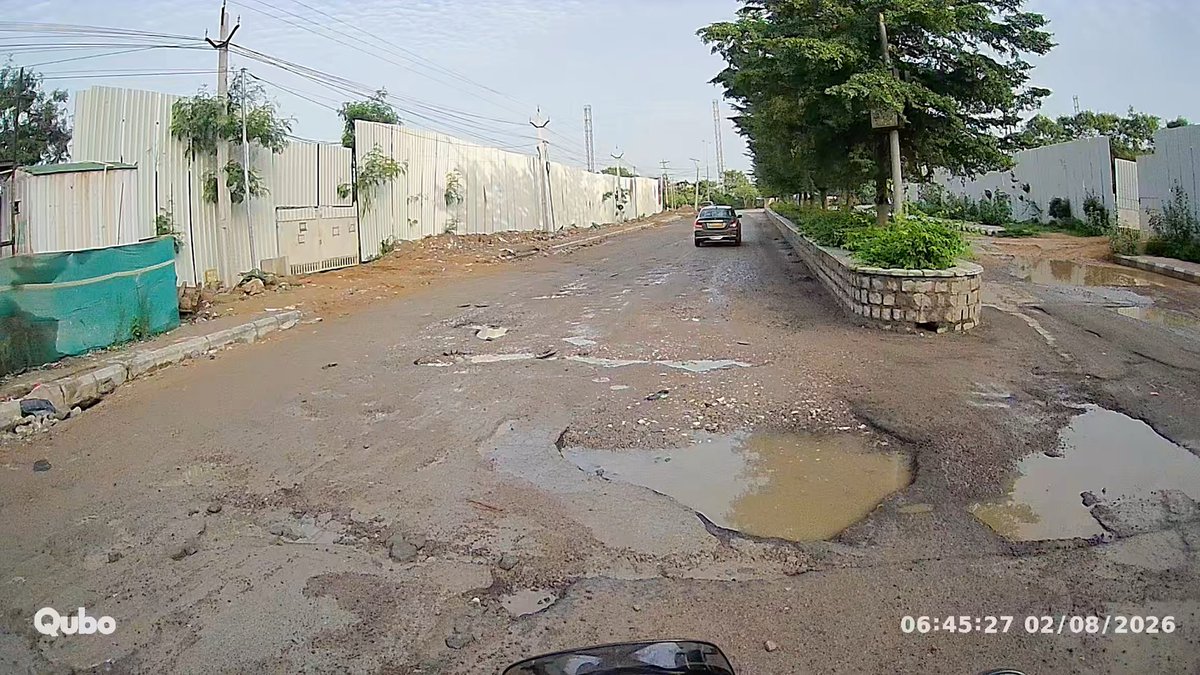Y2Kush's tweet photo. @CommissionrGHMC @GHMCOnline @CYBTRAFFIC 
Huge potholes on the Prestige high fields road. Very inconvenient for residents to approach the main ISB road. Very difficult for bike riders as well. Please look into this and help to restore the road. Thank you https://t.co/tAvSCwludY