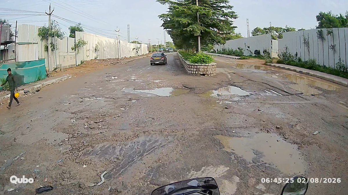 Y2Kush's tweet photo. @CommissionrGHMC @GHMCOnline @CYBTRAFFIC 
Huge potholes on the Prestige high fields road. Very inconvenient for residents to approach the main ISB road. Very difficult for bike riders as well. Please look into this and help to restore the road. Thank you https://t.co/tAvSCwludY