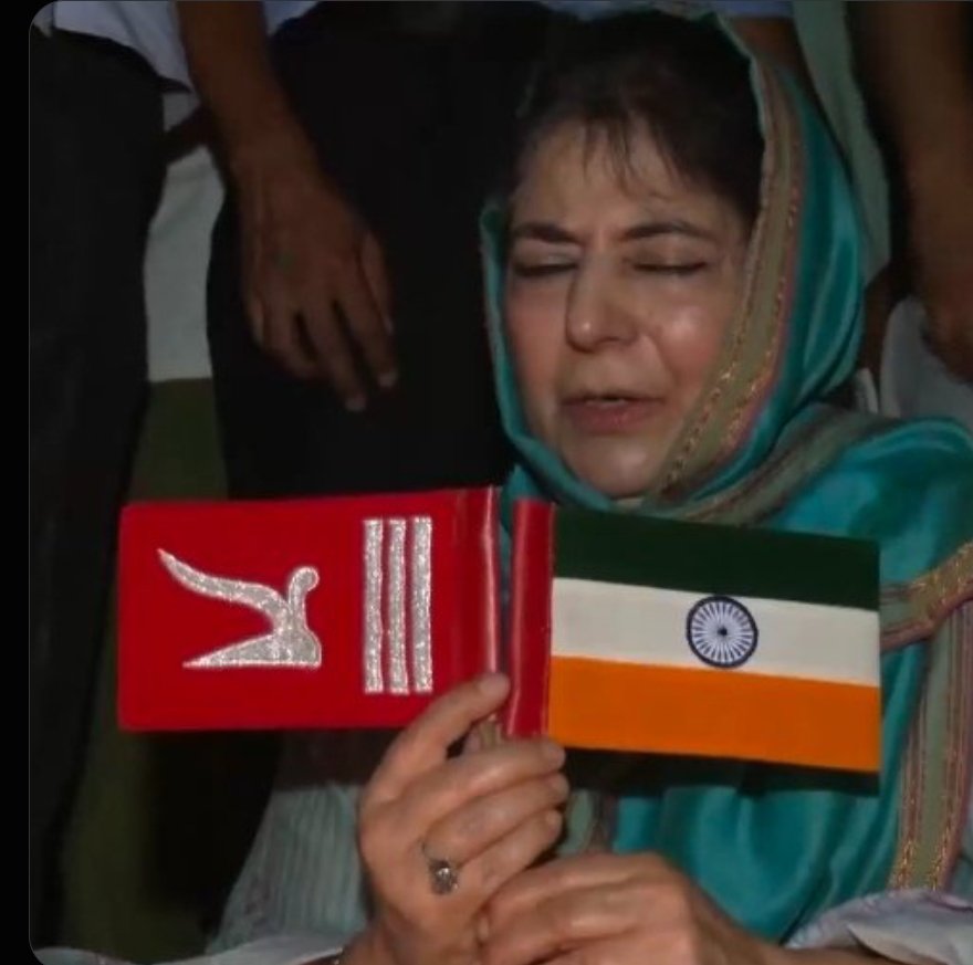 KalaSri83's tweet photo. Mahamad Mufti - Big News Troling:-

Article 370 was effectively abolished on August 5, 2019. 

She held India's flag in an upside down position. I don't think it was a mistake. She did it deliberately. https://t.co/74v9hMtsfd