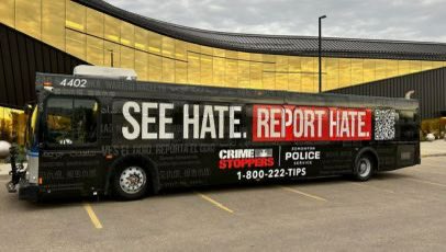 Veteran4Freedom's tweet photo. Edmonton Police Service bus advertisement.
@edmontonpolice 

Something can be said about the marketing &amp; specific colors used.

It’s subtle but deliberate.

US Holocaust Memorial Museum  identifies Nazi Colors as: 
black, white, and red. 

Designed to invoke fear. https://t.co/nHhDyg2RTc