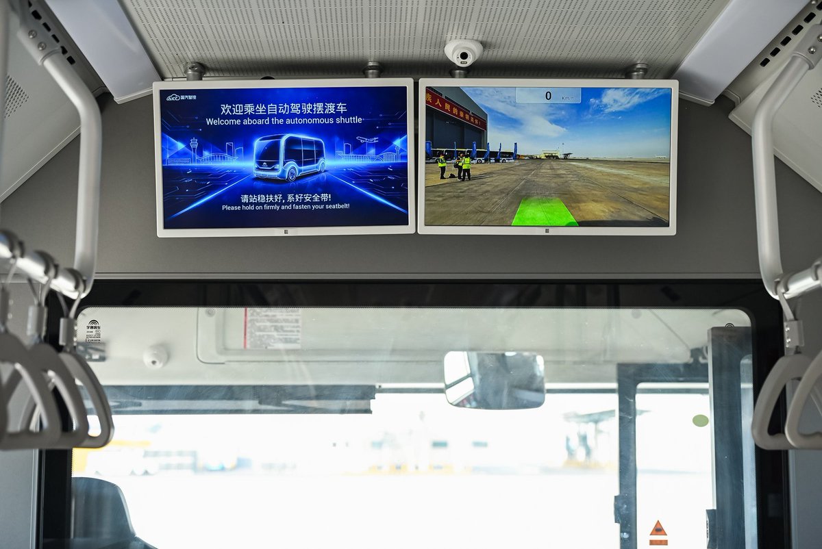 PDChina's tweet photo. No driver? No problem.   

At northwest China's Urumqi Tianshan International Airport, self-driving shuttle vehicles are now transporting passengers and supporting apron operations with no human behind the wheel. The vehicles can cruise, avoid obstacles and dock automatically—even in extreme weather. With more than 100 autonomous vehicles and smart devices already in use, the airport is taking a big step toward a smarter, more efficient future.
