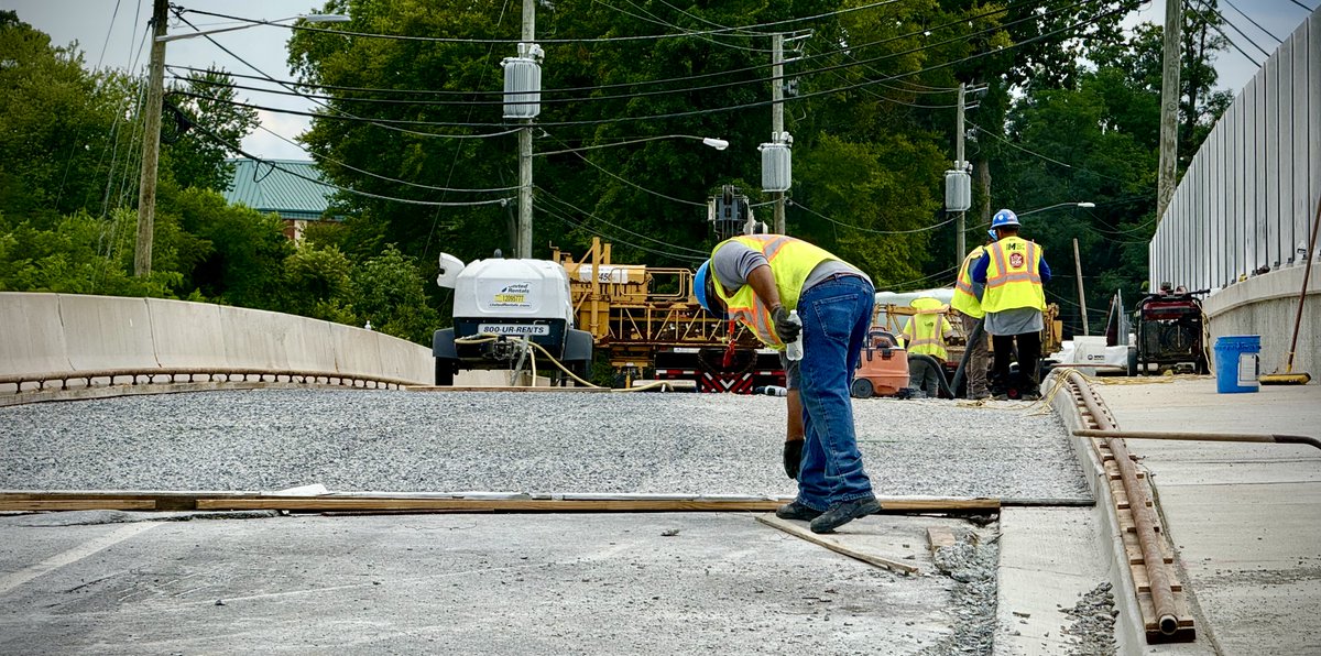 TimSloanDC's tweet photo. The Lyttonsville Rd bridge rebuilt in 2019 for the @PurpleLineMD station is now having the entire deck jackhammered to a 5" depth and re-poured due to mistakes by the original contractor. The roadway slope did not meet @MoCo_DTE specifications. #ContractorFail #BIKEDC https://t.co/HVwP0piVfs