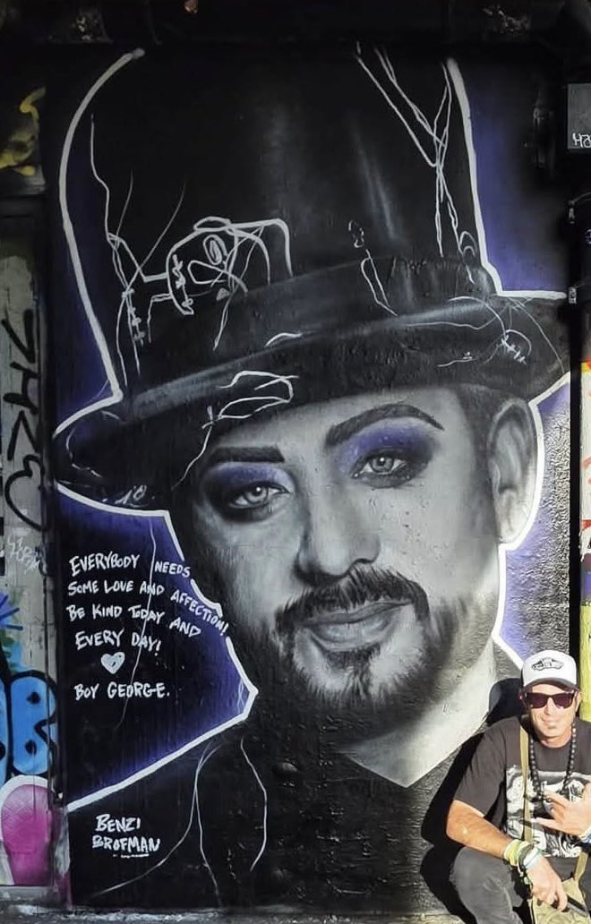 HeidiBachram's tweet photo. The mural of @BoyGeorge in Shoreditch was defaced with a Hamas red triangle last night. The terrorists use the symbol to place a target over those they plan to kill. This is a death threat. Take this seriously @metpoliceuk https://t.co/bq4ZPxV2sJ