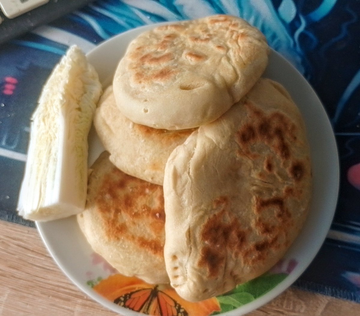 zelthezealous's tweet photo. quick cheese buns with cabbage on side that was forced upon me https://t.co/4WDjbK14lr