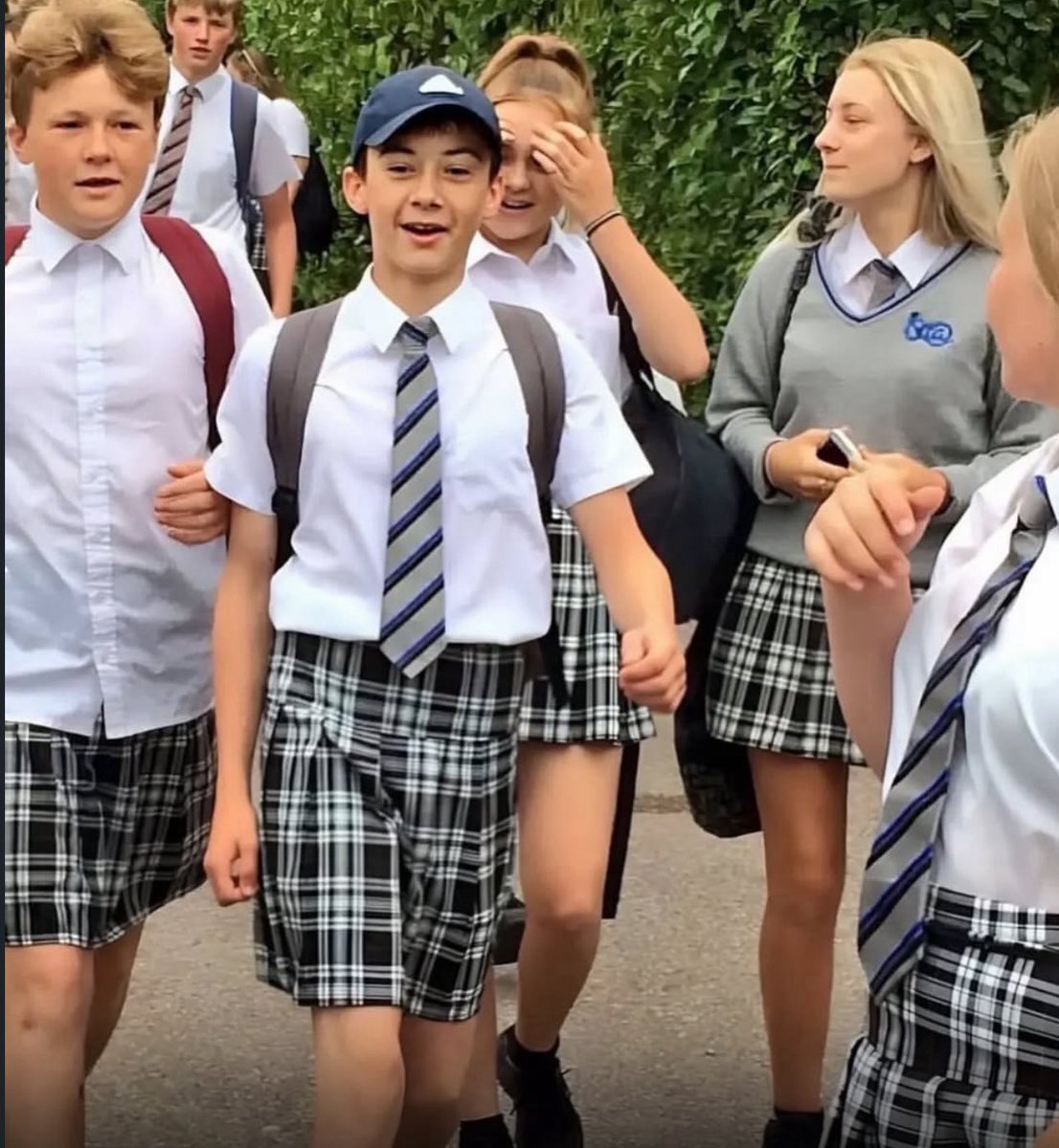 Puppieslover's tweet photo. School banned boys from wearing shorts during a heatwave, so they showed up in skirts instead. https://t.co/0RkeAxNUX5