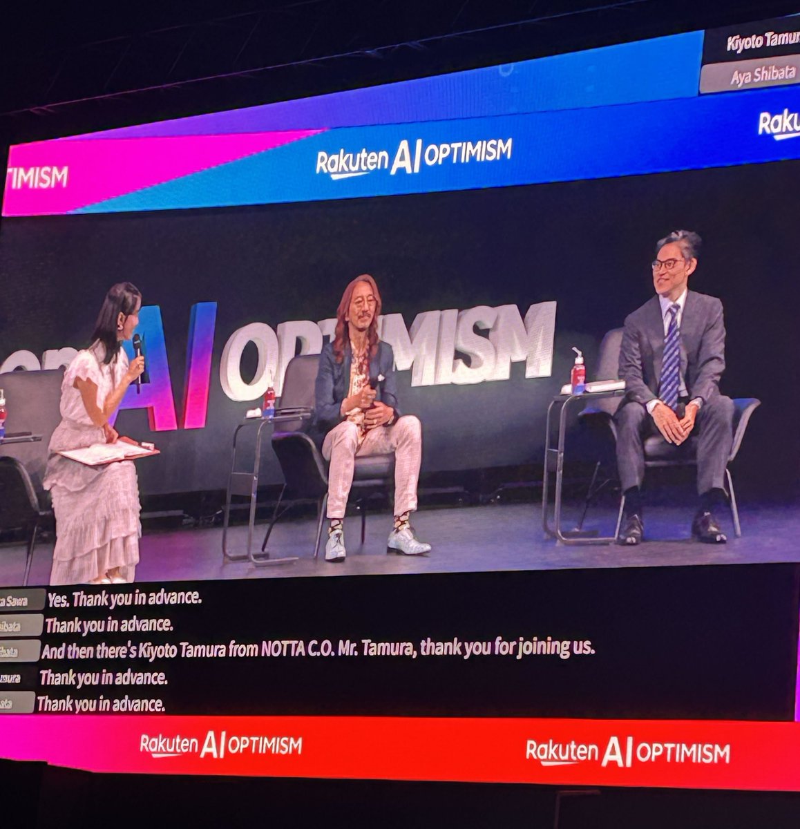 JapanNotta's tweet photo. 本日より開催される「Rakuten AI Optimism」にNottaが出展中！✨

会場では、Notta AIを直接お試しいただける体験ブースをご用意しています。

さらに！ 先ほどのビジネスカンファレンスには弊社COOの田村が登壇し、ビジネスにおける「会話」の可能性や、音声AIが切り拓く未来について熱く語りました！

ご来場予定の皆様、ぜひNottaブースにお立ち寄りください！
#RakutenAIOptimism #Notta #音声AI