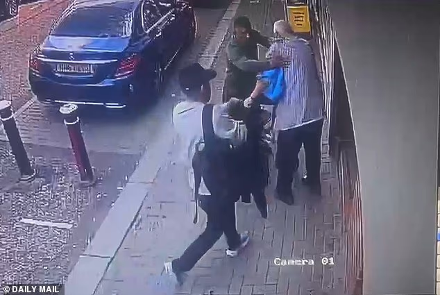 Alexandr4Denman's tweet photo. These two utterly low life foreigners robbed this elderly man the picture on the right shows how he veered the elderly man back against the wall  with his walker the man had cash in a blue plastic bag , he tried with all his energy to wave his walking stick at them to try get them away but they got away . He was left shuffling through the rest of his belongings while they walked away casually . He was watched and targeted because he had just come out of the bank and they knew he was an easy target .
STUDY THE PICTURES AND SHARE LETS FIND THEM !!