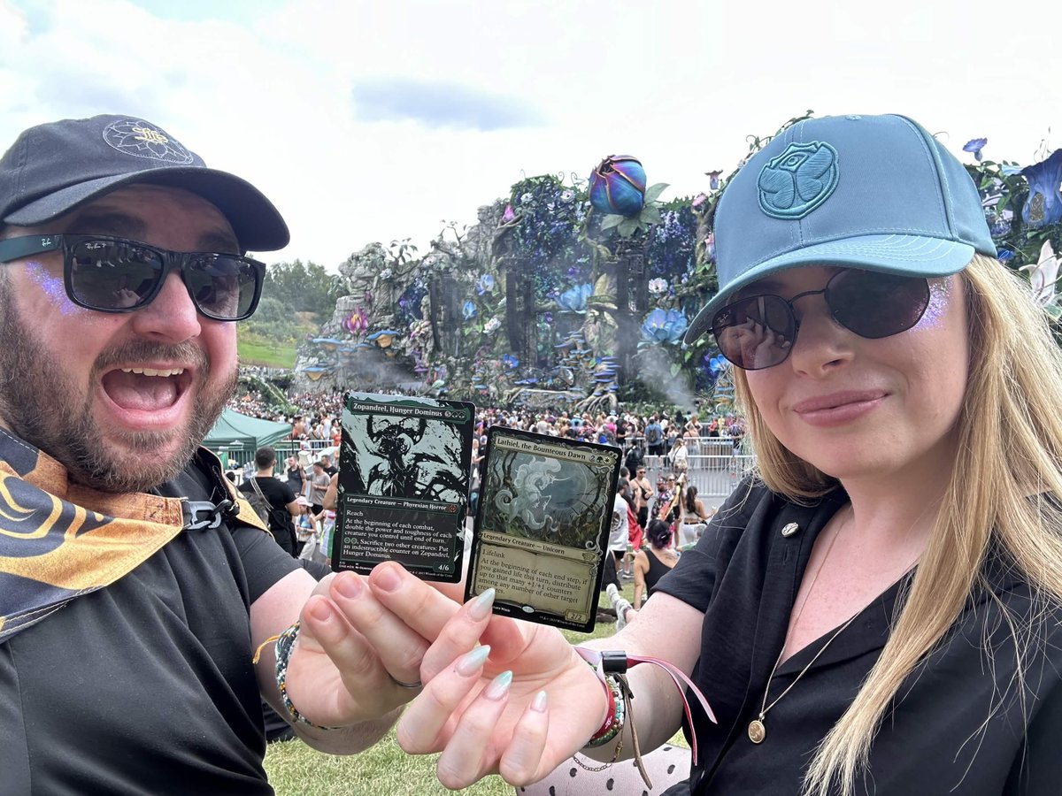 LHP64D's tweet photo. unts unts, boots and cats and boots and cats, here comes #Ravebound!
Emily and I have long shared a passion for EDM and Raves and TCG's so #RaveBound makes sense to us too!
Yes, we're literally at Tomorrowland with our MTG cards! https://t.co/O5nMS8TECJ