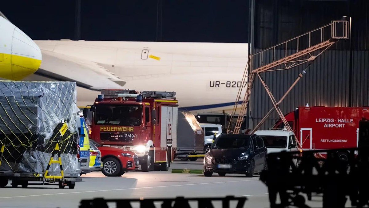 visegrad24's tweet photo. 🇩🇪 Russia planned a terrorist attack at Leipzig/Halle Airport in Germany

A drone carrying a package with a detonator and explosives was discovered near a parked Ukrainian Antonov Airlines cargo aircraft.

State and federal police deployed an explosives-disposal robot to isolate and secure the dangerous payload.

NATO and local intelligence investigators are treating the incident as a highly targeted state security crime, looking into possible Russian hybrid warfare or sabotage networks.