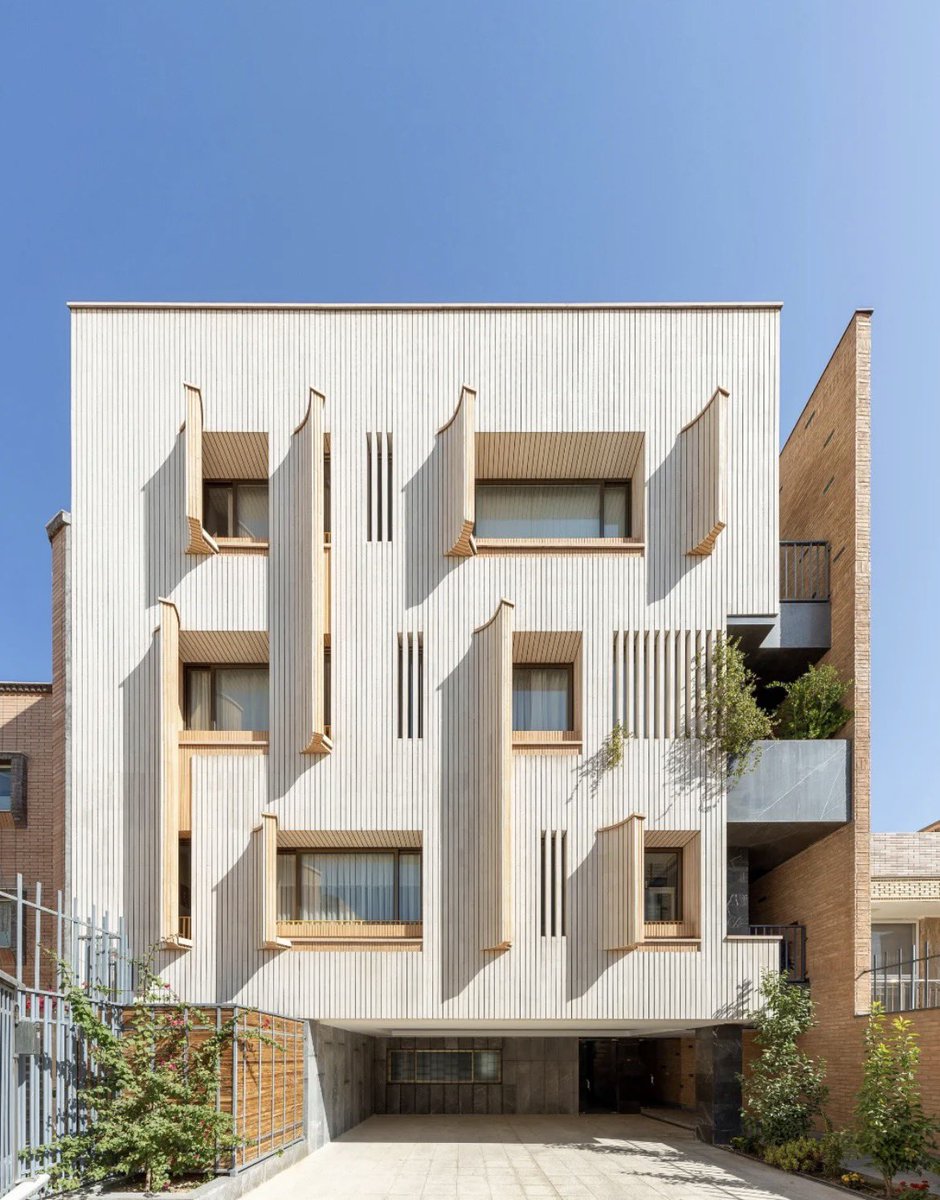 SustainableTall's tweet photo. The way the cladding looks to peel off the facade to provide shading for the windows

Apartments in Isfahan, designed by Masih Fazile Studio https://t.co/eMpOSiUeEp