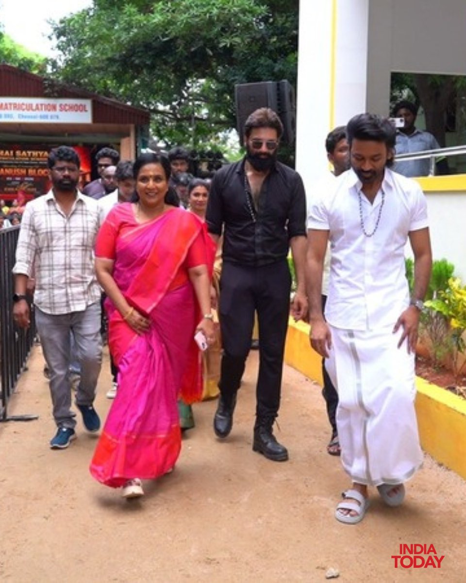 IndiaToday's tweet photo. Actor Dhanush has donated a newly constructed three-storey concrete building to a School in Chennai, where he studied from LKG to Class 10. Built at his own expense, the new structure replaces an older roofed building and has been named the "Dhanush Block."

The building was inaugurated on Wednesday in the presence of Dhanush, his schoolmate and cinematographer Kumaran, members of the 1999 batch, and his sisters, Karthika Devi and Vimalageetha.

In an emotional moment, Dhanush touched the feet of his former teachers to seek their blessings and posed for photographs with them. Kumaran and his wife, Lakshmi Krupa, who were also Dhanush's classmates from LKG through Plus Two, attended the ceremony.

#Dhanush #Chennai #Education #TamilCinema #ITPhotoblog