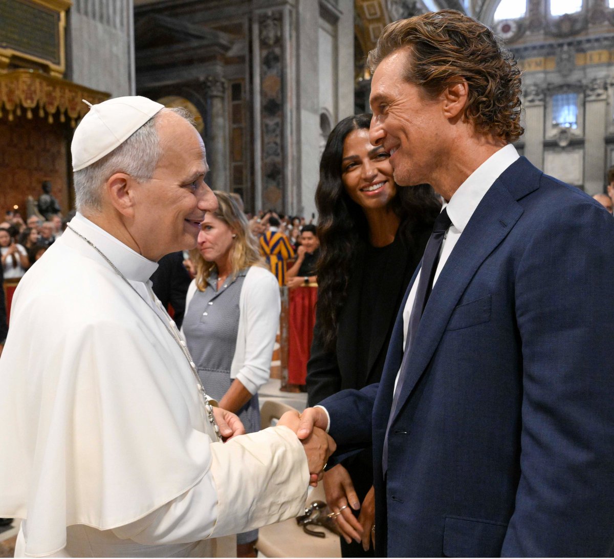 Church_POP's tweet photo. Pope Leo just met Matthew McConaughey and his wife inside St. Peter’s Basilica. The Oscar-winning actor now joins the growing list of celebrities who’ve made the trip to Rome to greet the pope. Photo: Vatican Media https://t.co/KERrDXKuXG